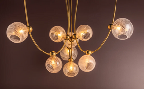 Astraia Chandelier | Vintage Brass Stems with Remolino Blanco Glass Globes